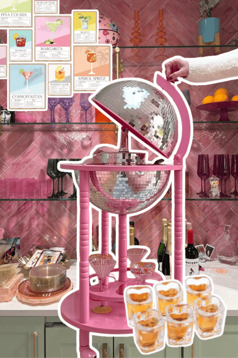 Pink cocktail stand with glasses and desserts, perfect for home hosting and stylish bar decor.